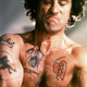 Illustration for article titled Marked men: 26-plus bad-ass characters with memorable tattoos